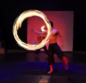 Phare Circus circus act - fire baton