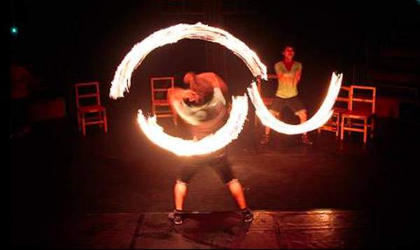 Phare Circus fire act - spinning fire ropes