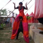 Phare Circus performers pose in makeup and costume outside the big top