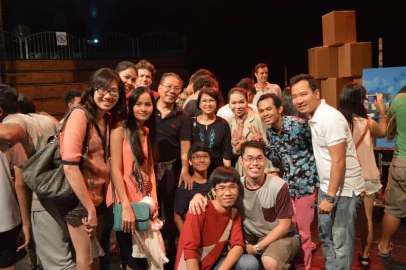 Sok Siphana poses for group photo with Phare Circus performers after the show