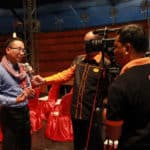 Phare Circus Dara Huot being interviewed by Cambodian television station in the big top