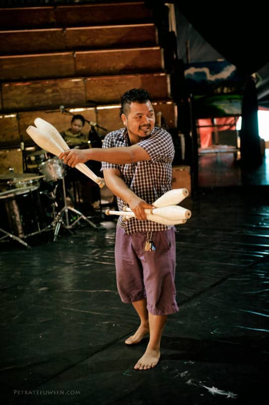 Phare Circus artistic coach Bonthoeun HOUN demonstrates juggling with bowling pins