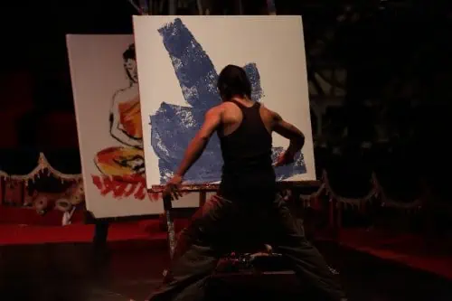 Phare Circus visual artist creates a live painting in the show "Sokha"