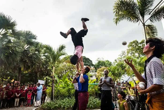 Phare Circus artists perform juggling and hand-to-hand balance at Made in Cambodia Market