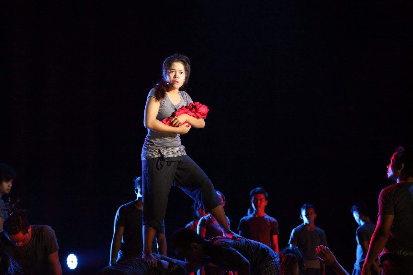Live performance of "See You Yesterday" by Phare Circus and Global Arts Corps, woman holds baby