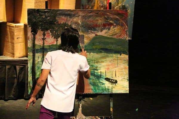Phare Circus visual artist Robit Pen live painting in "Sokha" performance