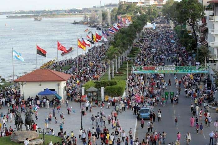 Water Festival Phnom Penh Cambodia - street crowded with pedestrians along the river