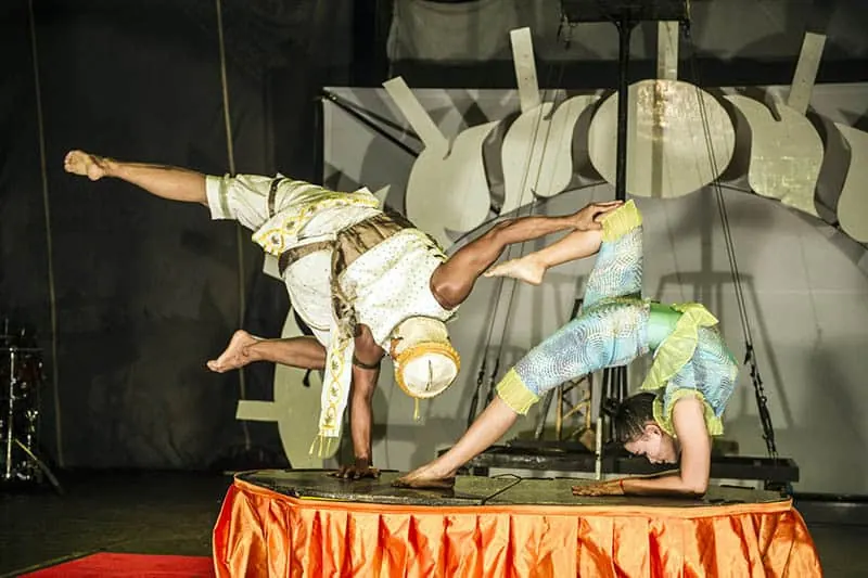 Phare Ponleu Selpak Open Days performance - contortionist and circus performer in Hanuman mask