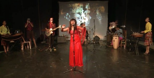 Galaxy Khmer and Phare Circus - singer and band performing on circular stage