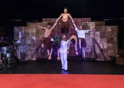 Phare Circus performance "Influence"; perfomers jump through human pyramid