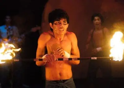 Phare Circus performance "Panic!": frightened male performer with fire baton