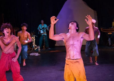 Phare Circus show "Panic!": male performers with colorful Cambodian farmer pants, one yelling in anguish