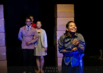 Phare Circus performance"Sokha": girl in poor clothes being adopted by happy mother and father after the war