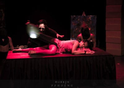 Phare Circus show "Sokha": female artist having a nightmare while taunted by ghosts of the war