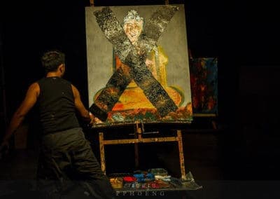 Phare Circus show "Sokha": visual artist live painting the destruction of a Buddha , war destroying art