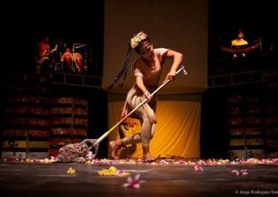 Phare Circus performance "Tchamlaek": female dancer mopping flower petals on circus stage