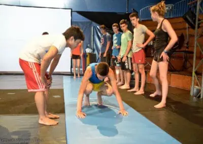 Phare Circus - circus arts workshops - students practicing tumbling skills